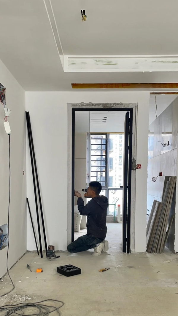 Prehung door installation on a project site