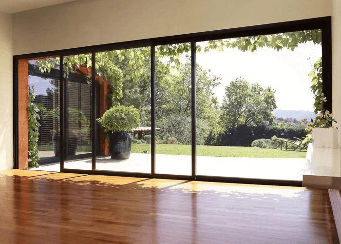 Slim frame panoramic sliding door design trend