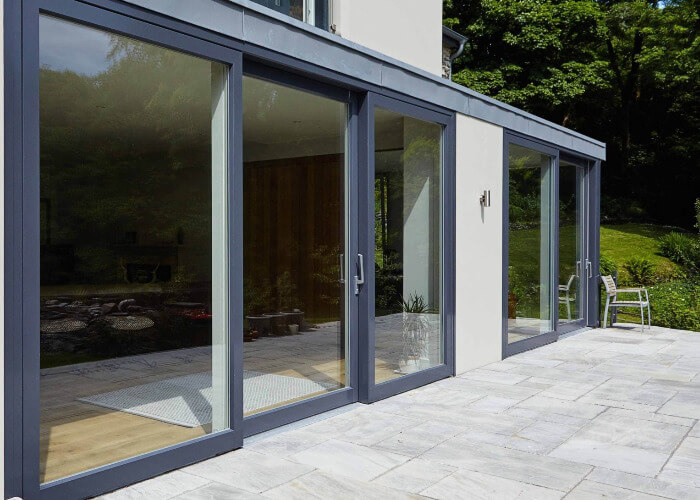 Aluminum casement door with glass panels
